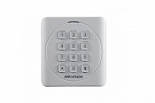 DS-K1801EK - Считыватель EM карт с механической клавиатурой, дальность считывания: 30-50 мм; поддержка протокола Wiegand (W26/W34); DC12В; ≤1.6Вт; -40 °C...+70°C; IP65; размер 87×87×13.3мм; пластик.
